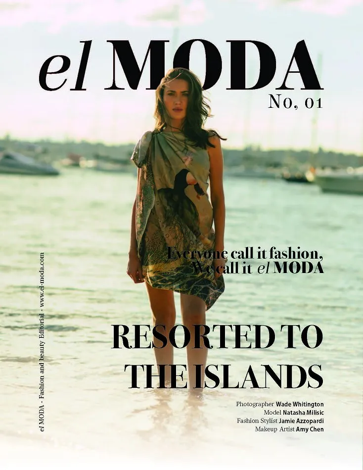 El MODA cover showing Natasha Milisic in a patterned dress in shallow water beneath the headline Resorted to the Islands